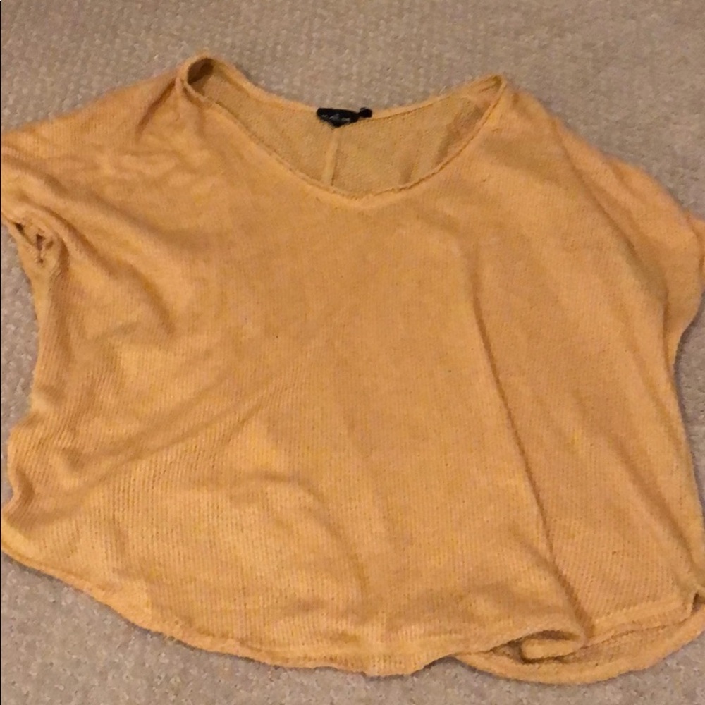 Knit out from under top